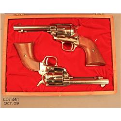 Cased pair of Colt Single Action Frontier Scout  revolvers, .22LR cal., 4-3/4" barrels, nickel  fini