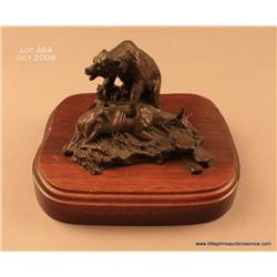 Lowell Davis bronze of bear standing over a dead  steer, approx. 5” high, 7” wide and 5” deep; in  o