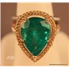 Image 2 : One two tone custom designed ladies emerald and  diamond ring set with one 6.95 ct pear shape  emera