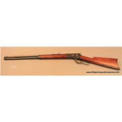 Winchester Model 1892 lever action rifle, .38 WCF  cal., 24” octagon barrel, blue finish, plain wood