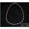Image 1 : One twist and link design necklace made in 14k  white gold and bezel set with 27 round diamonds  app