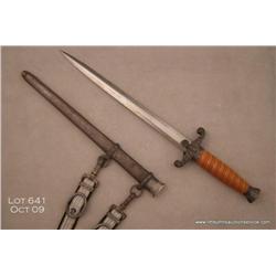 German WW II Army dagger with scabbard and hanger  in overall very good to fine condition; cross  gu