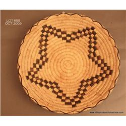 Papago 13 inch diameter basketry tray in squash  blossom design.  Excellent.  Estimate $125 - $250