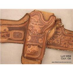 Beautifully tooled leather double holsters and  wide belt rig for a large frame revolver, such as  a