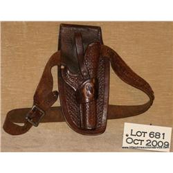 Early single loop holster for Colt Woodsman  initial "C" on loop wide skirt w/cart belt.  Good  cond