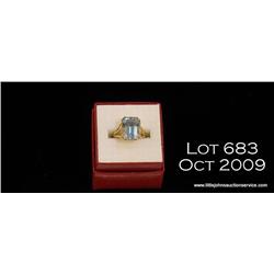 14kt ladies yellow gold blue stone ring, 8 grams.   Est. $150 - $300