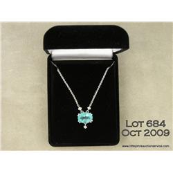 14 kt white gold emerald pendant, 8 grams, set  with one oval emerald weighing 6.3 carats further  a