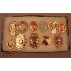 Lot of eleven misc. security badges in riker case  including an older William J. Burns Detective  Ag