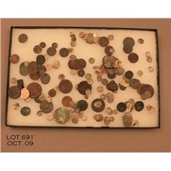 Approx. 100 ancient and antique foreign coins in a  riker case including mostly dug ups. A very  int