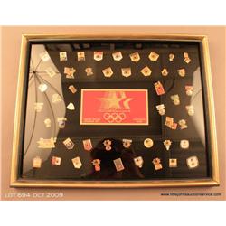 Framed set of 1984 Olympic Sponsor pins, 19.5" x  15.5".  Est. $75-$150.