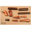 Image 1 : Misc. lot of wood grips and stocks including a  custom wood grip with unmarked metal back strap  and