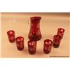 Image 1 : Set of cranberry colored crystal glasses and a  serving pitcher.  Est. $75-$150.