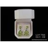 Image 1 : Stylish 10 karat white gold ladies drop earrings  set with peridot and diamonds weighing approx.  7.