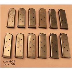 Lot of 12 pistol magazines for the 1911 Model Colt  pistol in .45 caliber.  Est.:  $150-$200.