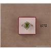 Image 2 : Dazzling 14 karat white gold ladies custom design  ring set with a center very fine green peridot  w
