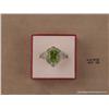 Image 3 : Dazzling 14 karat white gold ladies custom design  ring set with a center very fine green peridot  w