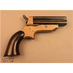 Sharps four barrel derringer, .30 cal., 3”  barrels, blue finish, wood grips, #3568. This gun  is in