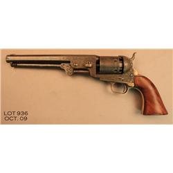 Colt Model 1851 Navy, period engraved, .36 cal.,  7-1/2” octagon barrel, wood grips, #32497. This  g