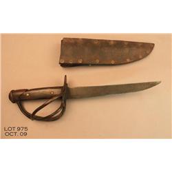 Iron knife made from a sword blade and mounted  with a brass guard and pommel with later wood grip  