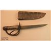 Image 1 : Iron knife made from a sword blade and mounted  with a brass guard and pommel with later wood grip  