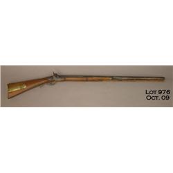 Converted J. Henry half stocked percussion rifle,  .58 cal., 32” half round, half octagon barrel.  T
