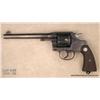 Image 1 : COLT New Service, # 330505, .45 Colt, 7.5” barrel,  blued finish, checkered medallion grips.   Revol