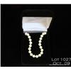 Image 1 : Strand of pearls, 6.5 - 7 mm.  Est. $100 - $200