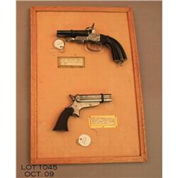 Two antique derringers mounted and framed as  display consisting of an English double barrel SXS  pi