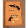 Image 1 : Two antique derringers mounted and framed as  display consisting of an English double barrel SXS  pi
