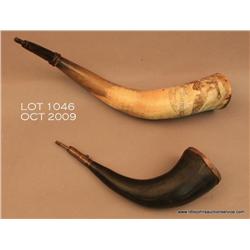 Lot of two old powder horns including an old  buffalo horn, approx. 12” overall with some worm  dama