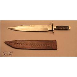 Unmarked large clip point bowie knife with horn  scale grips, approx. 17” overall with a 12” blade, 