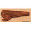 Image 1 : Tooled leather slim Jim holster for a Colt ’51  Navy revolver, in overall very good condition with  