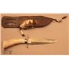 Image 2 : Modern made large clip point knife and Indian  style heavy leather sheath with feather and carved  b