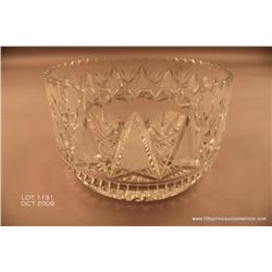 Large cut glass bowl 10 1/8" in diameter by 6.25 "  tall, unsigned.  Est. $50-$75.