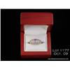 Image 1 : Attractive 14 karat white gold ladies designer  ring set with a center fine Tanzanite and pave set  
