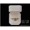 Image 1 : Elegant 14 karat yellow gold ladies ring set with  a custom cut center Citrine weighing approx. 4.00
