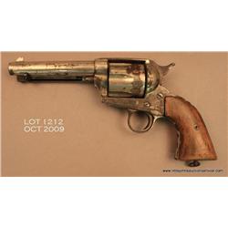 Mexican copy of a Colt SAA revolver, .44-40 cal.,  4-3/4” barrel, nickel finish, wood grips, #223.  