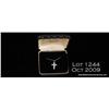 Image 1 : One white gold cross set with 24 baguettes 0.38 ct  and 4 round diamonds 0.08 ct. TW diamonds 0.38 c