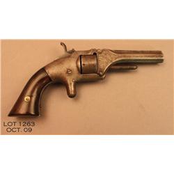 Manhattan spur trigger revolver, .22 cal., 3”  barrel, engraved barrel assembly, #867. This gun  is 