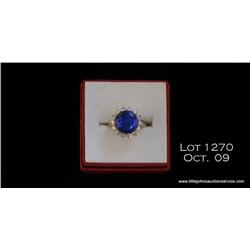 Ladies 14kt white gold black and diamond ring, 5  grams.  Opal is approx. 2.5 carats also accented  
