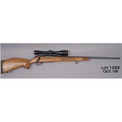 Weatherby Mark V bolt action rifle, .240 Magnum  cal., 25” round barrel, blue finish, checkered  woo