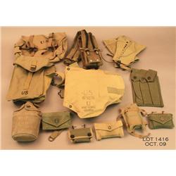 Large lot of WWII web gear, scabbards canteen, mag  pouches, scabbards and many bonanza items.  All 