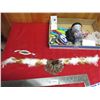 Image 4 : RCMP belt buckle, flash light, miniature plates, pens, travel mug, beaded hair clips, feather hat ba