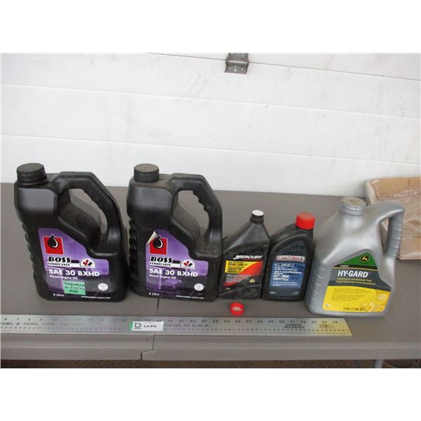 John Deere Hy Gard 3.78L (full), Mercury gear lube (full) + partial jugs of oil