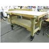 Image 1 : Small workbench with vise (73x32x41) on casters, with extension cord