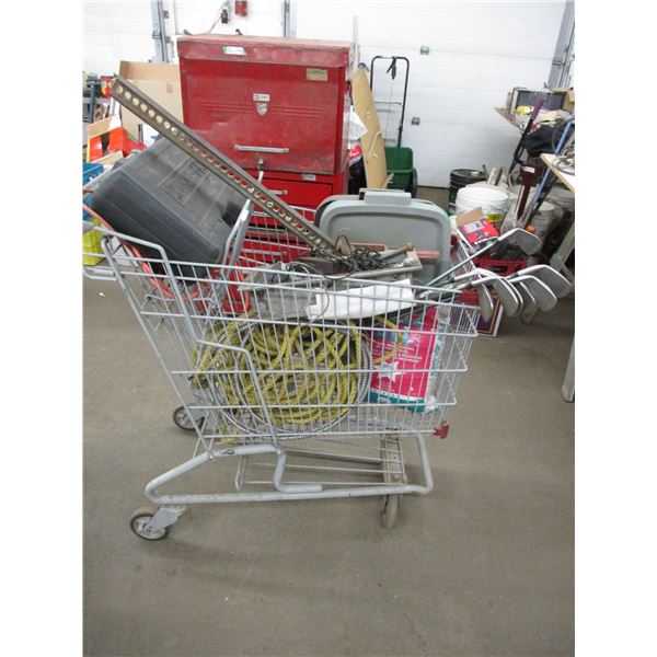Shopping cart with golf clubs, cords, misc