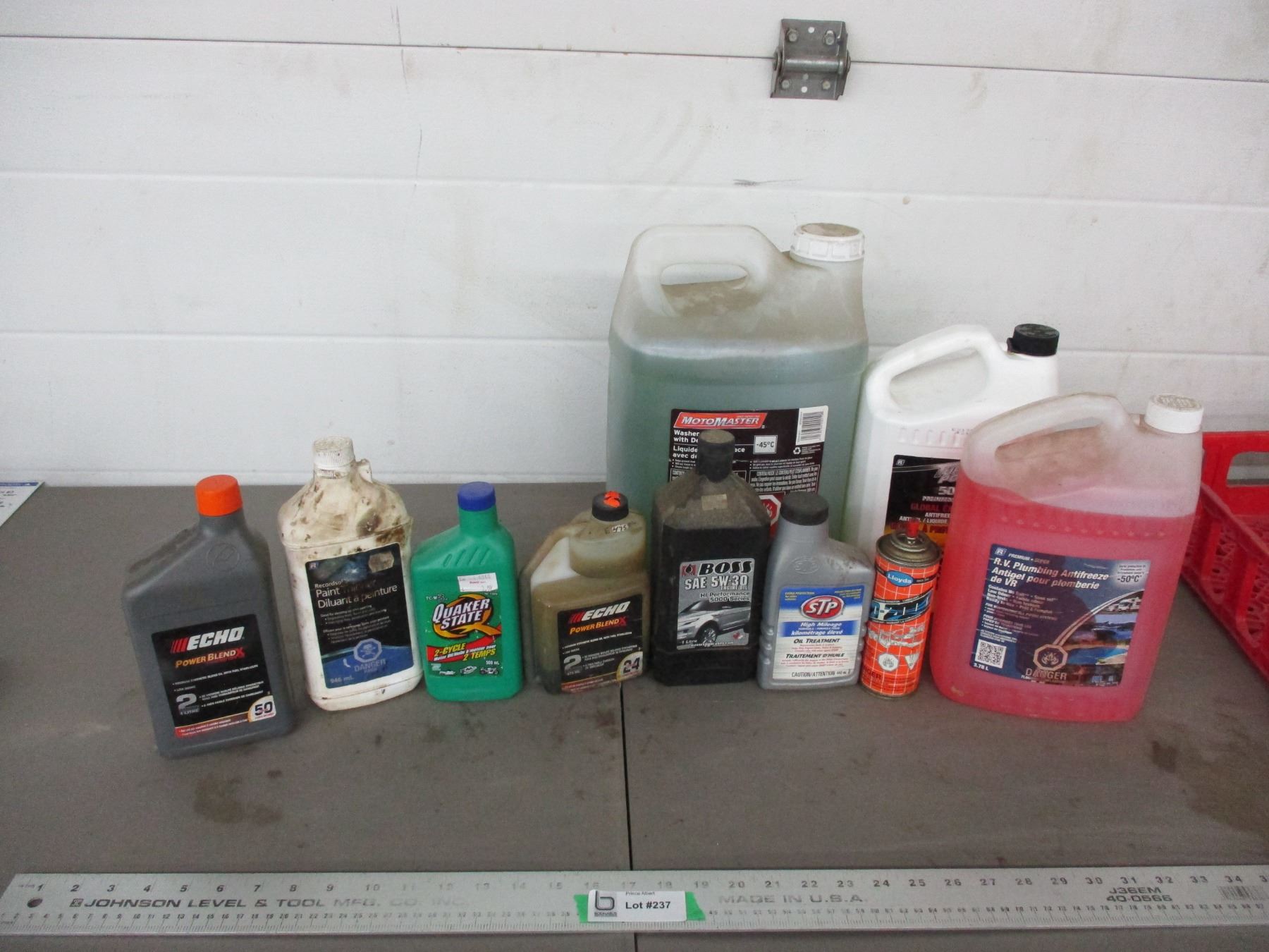Partial containers with oil, antifreeze, washer fluid