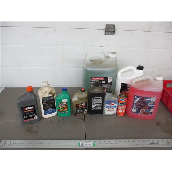 Partial containers with oil, antifreeze, washer fluid