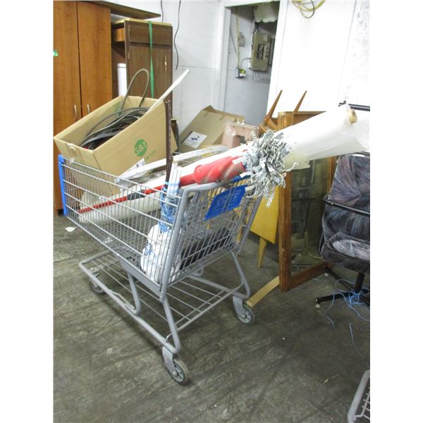 Shopping cart, roll of plastic, piping, etc