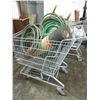 Image 1 : Shopping cart, roll of roofing black velvet, water hose